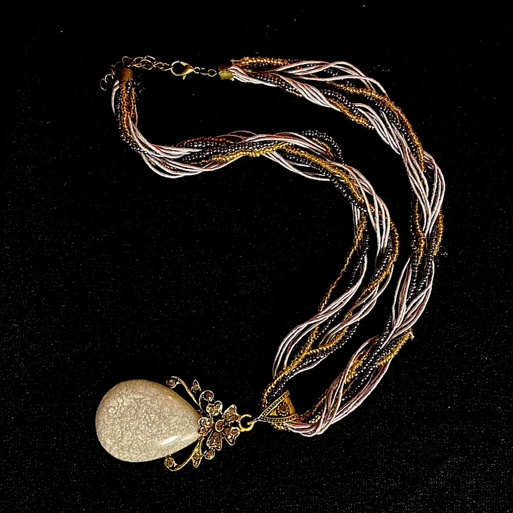 Lovely tiny beaded and twisted cloth necklace with jeweled stone pendant